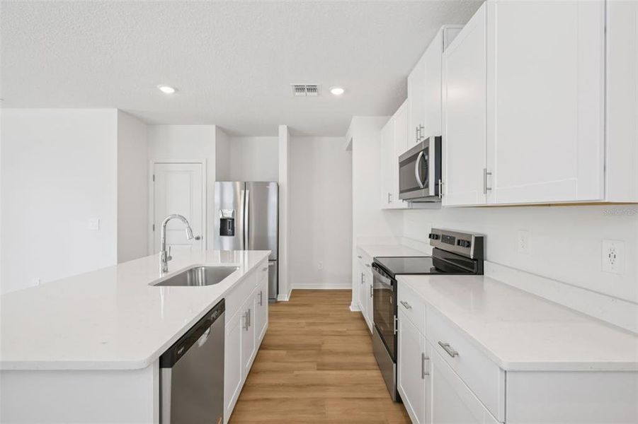 Furnished interior view inside a new home in Benton Hills - Premier Series, Brooksville (Image 6). Furnished interior view inside a new home in Benton Hills - Premier Series, Brooksville (Image 6).