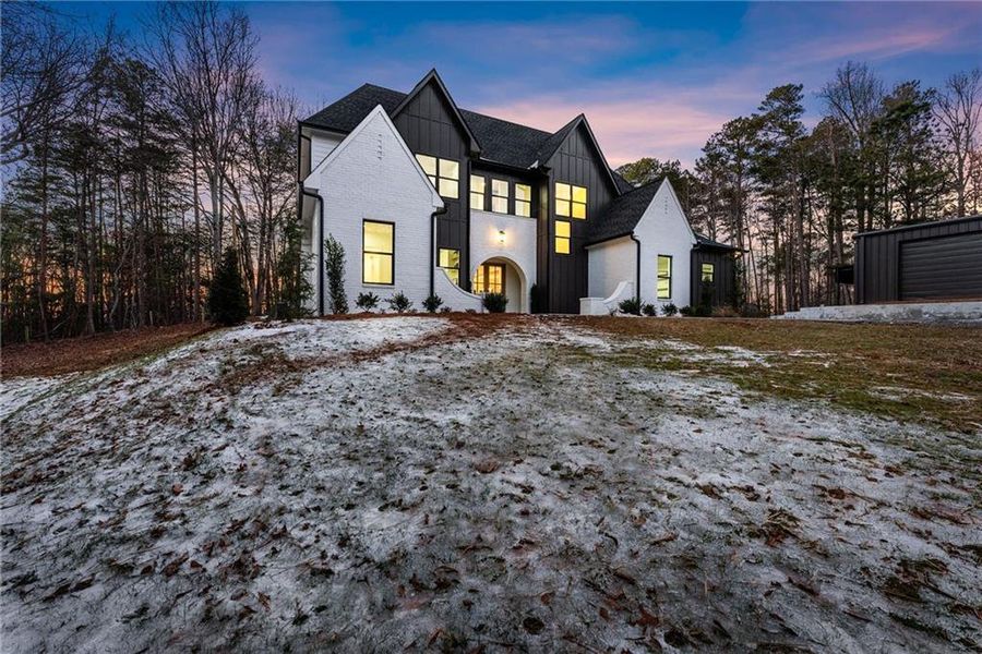 Front exterior of a new home in , Cumming, GA, highlighting curb appeal (Image 34). Front exterior of a new home in , Cumming, GA, highlighting curb appeal (Image 34).