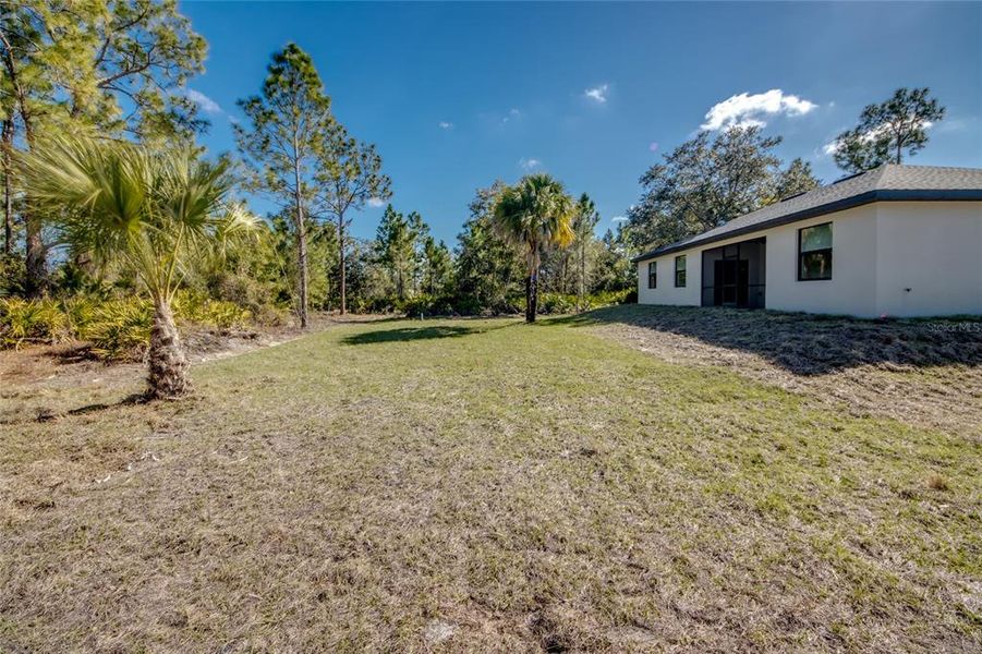 Exterior details and patio area of a home in , Lehigh Acres (Image 26). Exterior details and patio area of a home in , Lehigh Acres (Image 26).