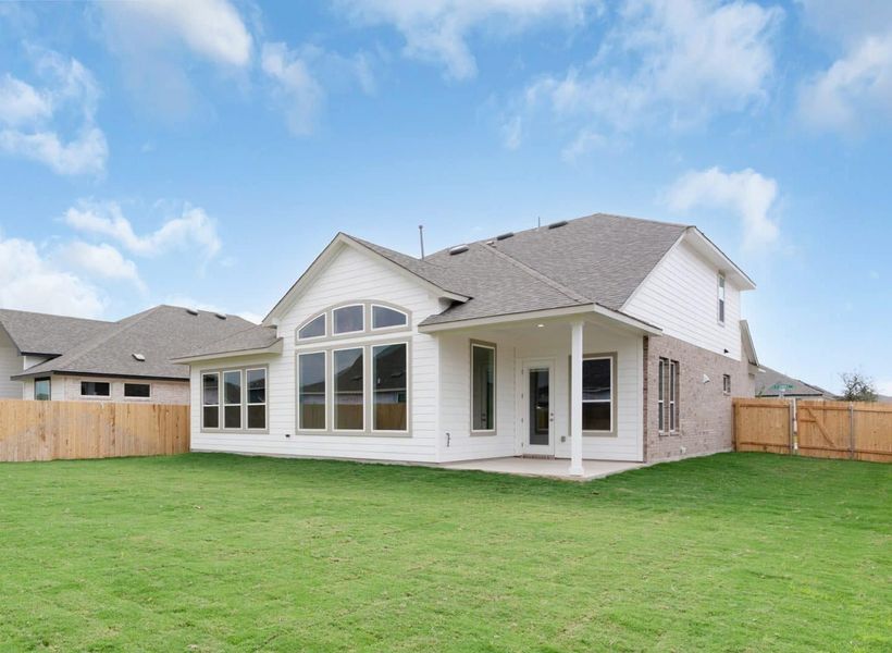 Exterior details and patio area of a home in University Heights, Round Rock (Image 4).