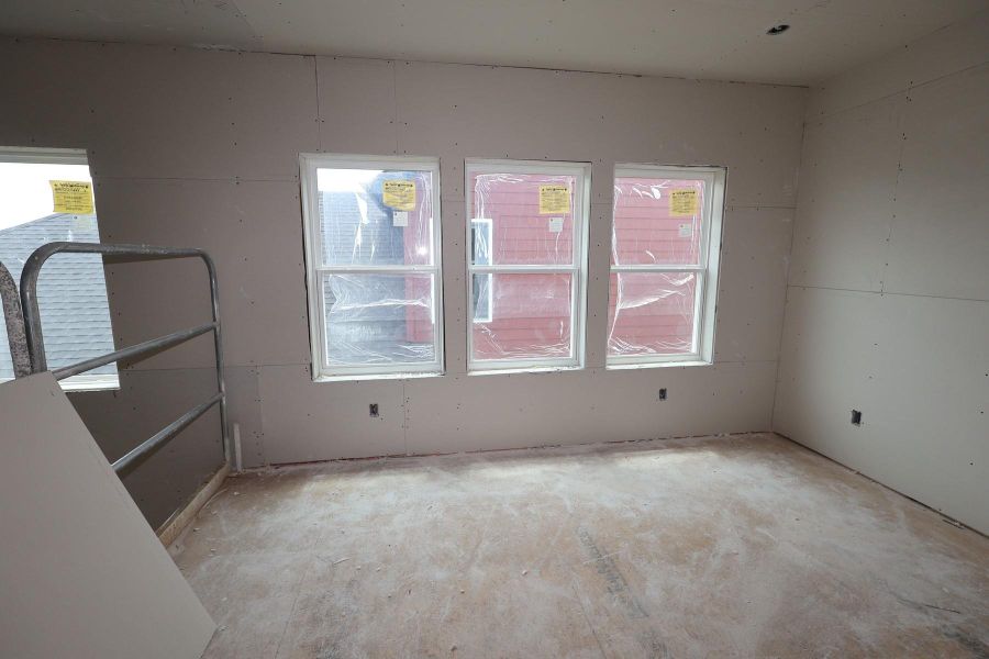 In-progress construction of a new home in Elyson - Grove Row Collection, Katy, TX (Image 11).