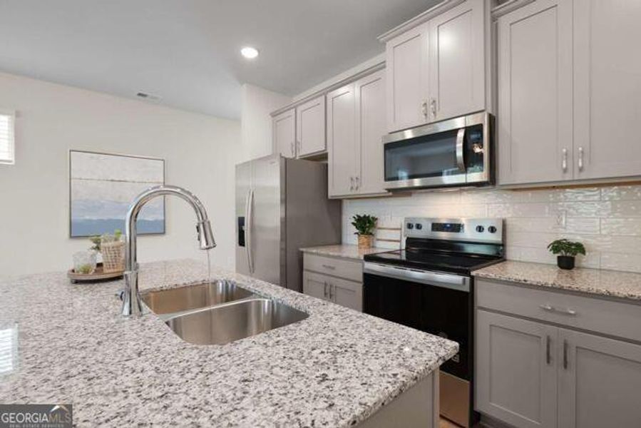 Furnished interior view inside a new home in Walden Park - The Retreat, Jonesboro (Image 5).