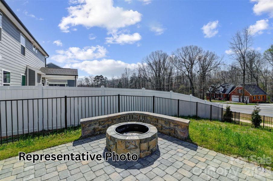 Exterior details and patio area of a home in Enclave at Riverdale, Huntersville (Image 21).