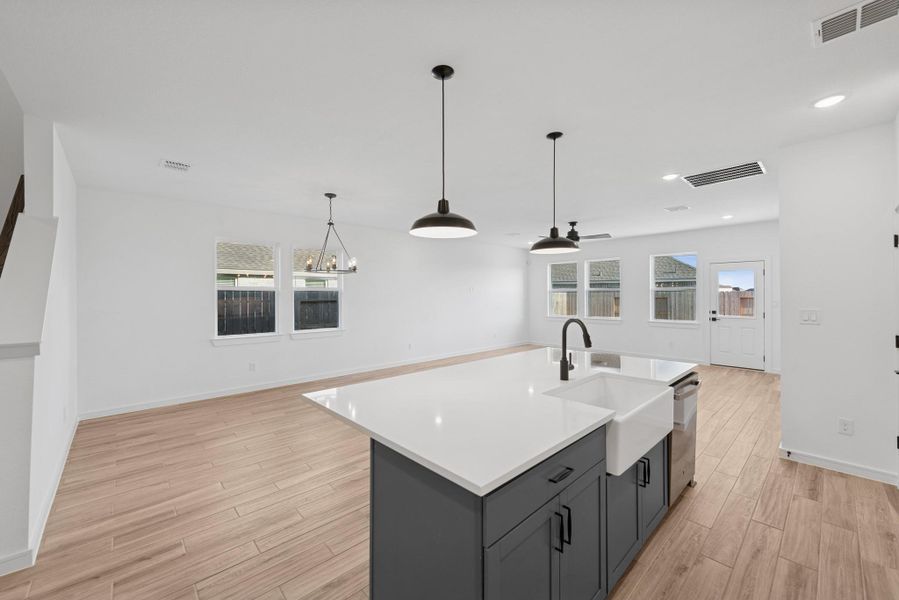 Kitchen overlooks dining area and great room Kitchen overlooks dining area and great room