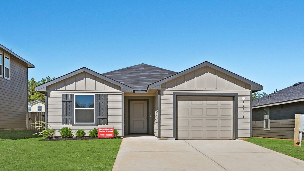 Front exterior of a new home in McCrorey Trails, Conroe, TX, highlighting curb appeal (Image 1).