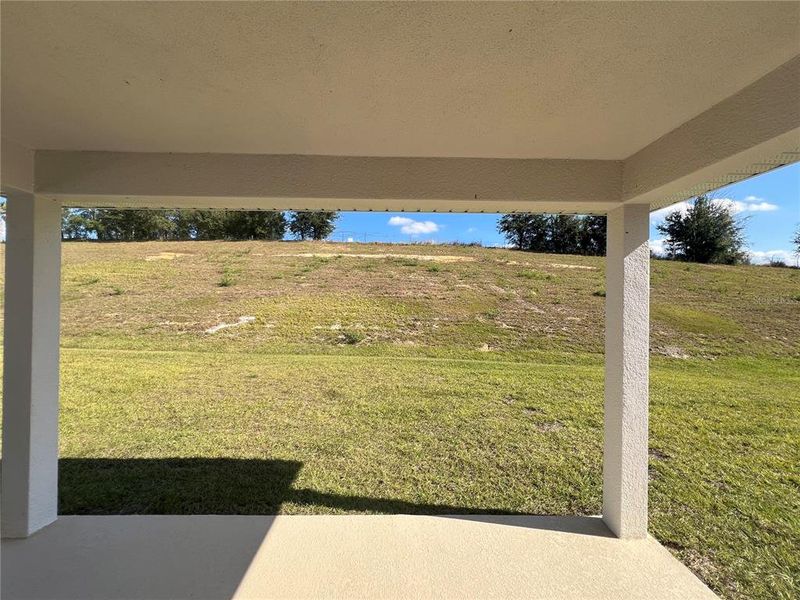 Exterior details and patio area of a home in Abbey Glen, Dade City (Image 3).