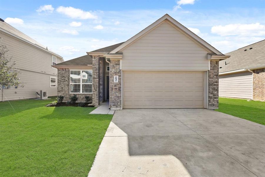 Front exterior of a new home in Deer Creek, Fort Worth, TX, highlighting curb appeal (Image 1).