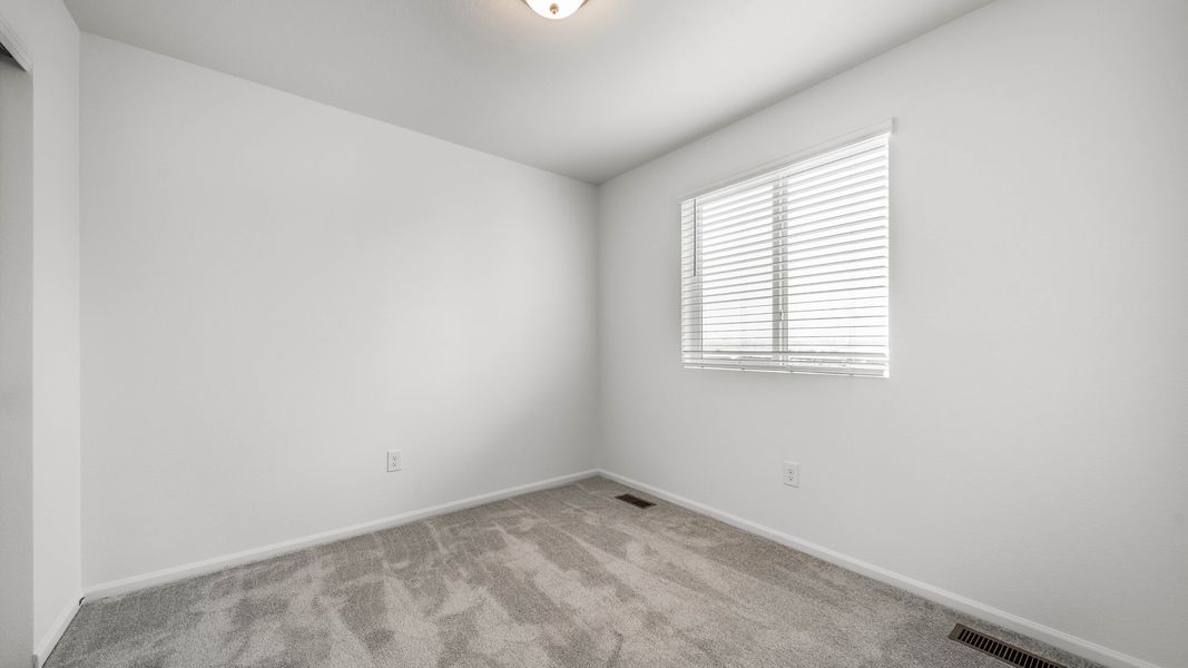 Spacious, unfurnished interior of a new home in Reunion, Commerce City (Image 22).