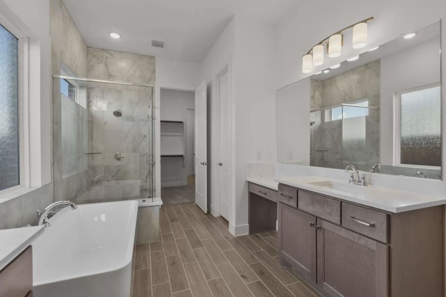 Representative furnished interior of a home built from the Sorenstam by Chesmar Homes in Riceland Alley Loads, Mont Belvieu (Image 9).