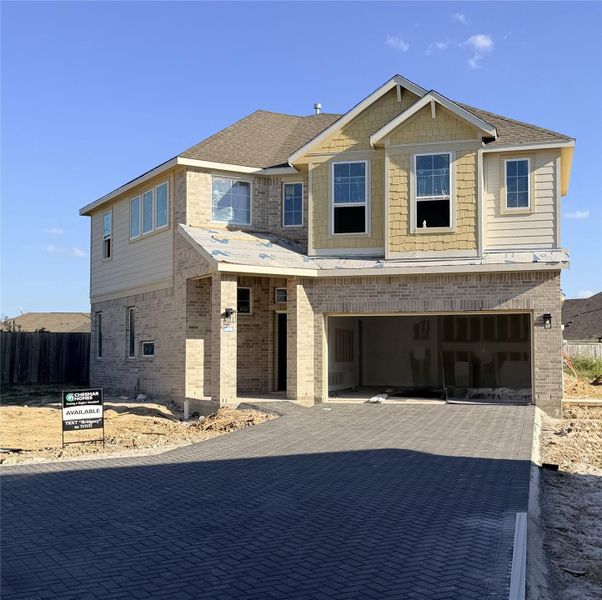 Front exterior of a new home in Bridgeland, Cypress, TX, highlighting curb appeal (Image 2). Front exterior of a new home in Bridgeland, Cypress, TX, highlighting curb appeal (Image 2).