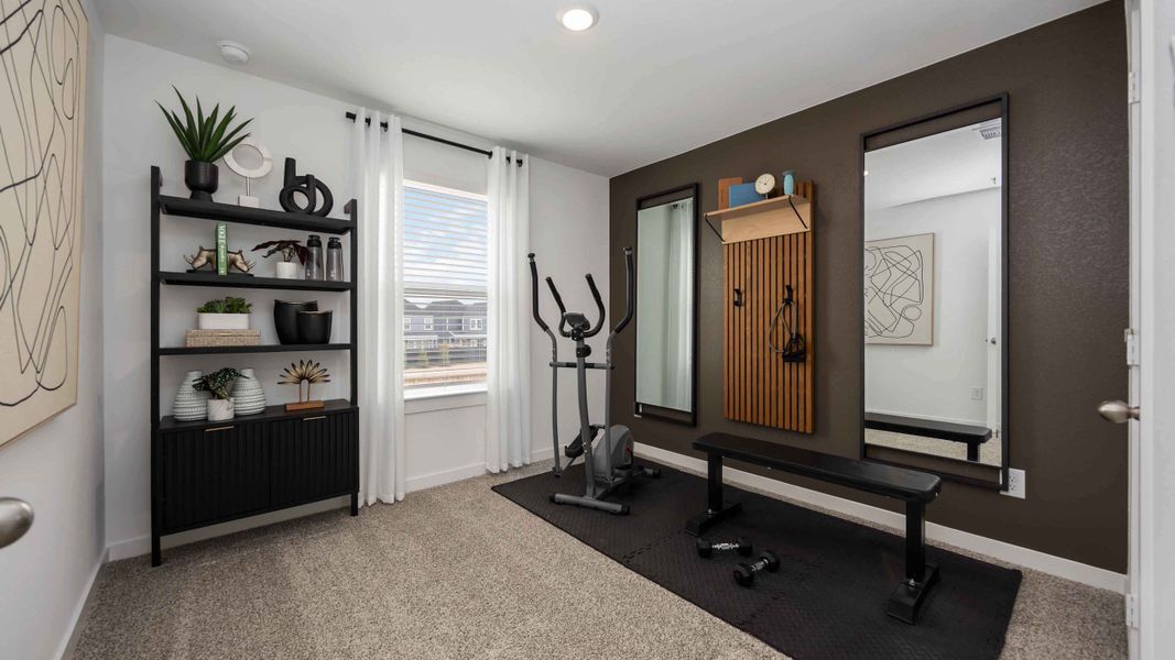 Furnished interior view inside a new home in Grand West, Houston (Image 11).