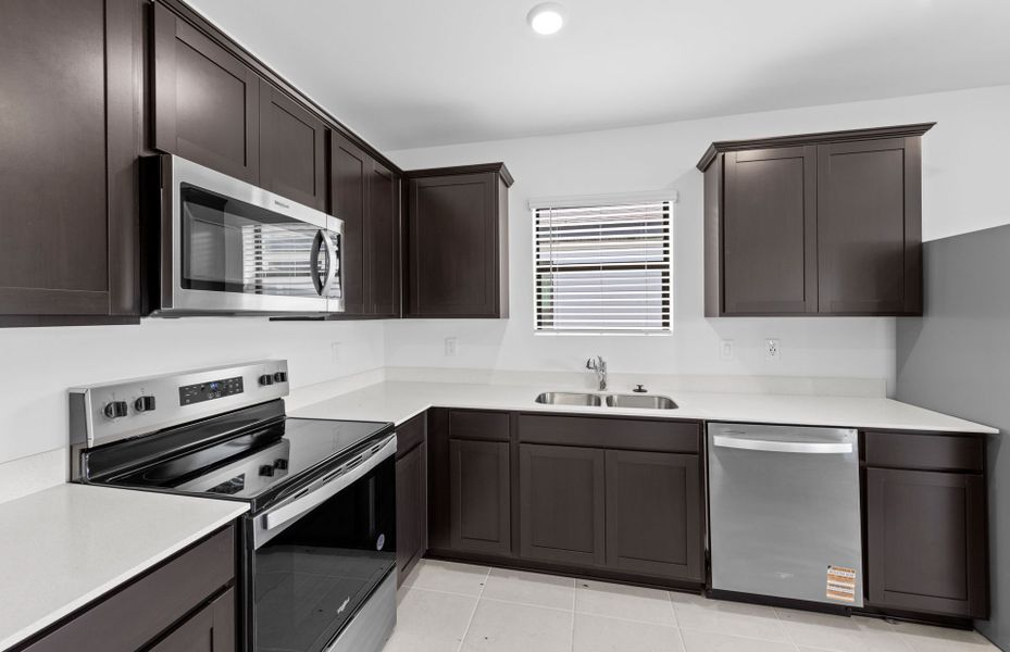 Furnished interior view inside a new home in Caloosa Cove, Labelle (Image 11).