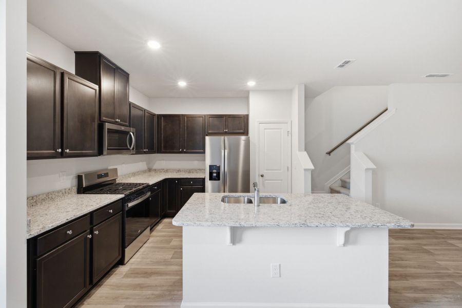 Furnished interior view inside a new home in Carpenter Falls, Durham (Image 11).