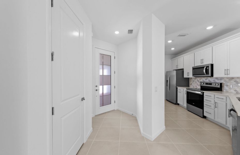 Furnished interior view inside a new home in Del Webb Naples, Ave Maria (Image 7).