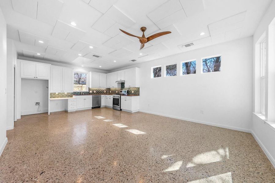 Small stones laid in concrete offers unique flooring.