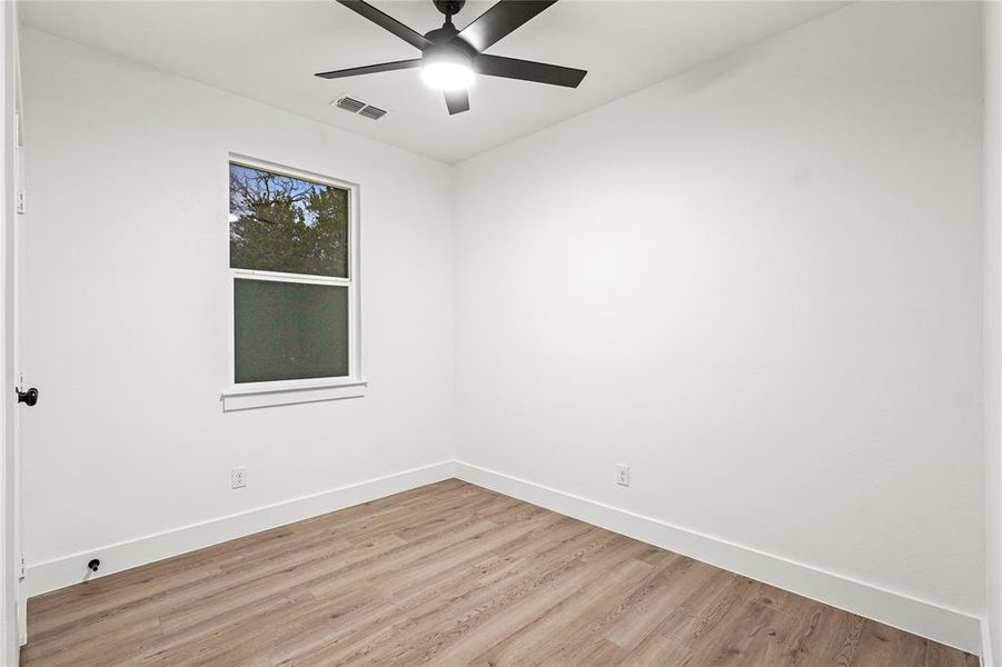 Bathroom with vanity, plus walk in shower, and tile patterned floors