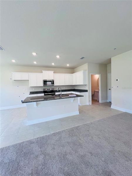 Furnished interior view inside a new home in Harmony Central, St. Cloud (Image 3).