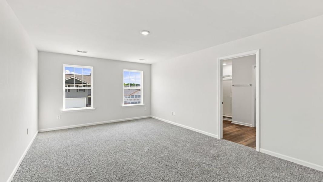 Spacious, unfurnished interior of a new home in Bentley Park, Greenwood (Image 31).