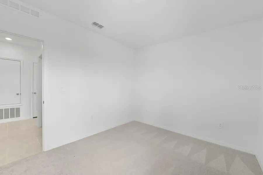 Spacious, unfurnished interior of a new home in Firethorn, Parrish (Image 28).