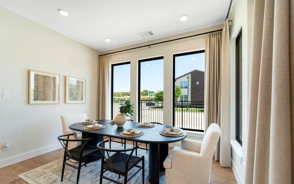 Representative furnished interior of a home built from the Rainier by CastleRock Communities in The Summit at Center Stage, Keller (Image 13).