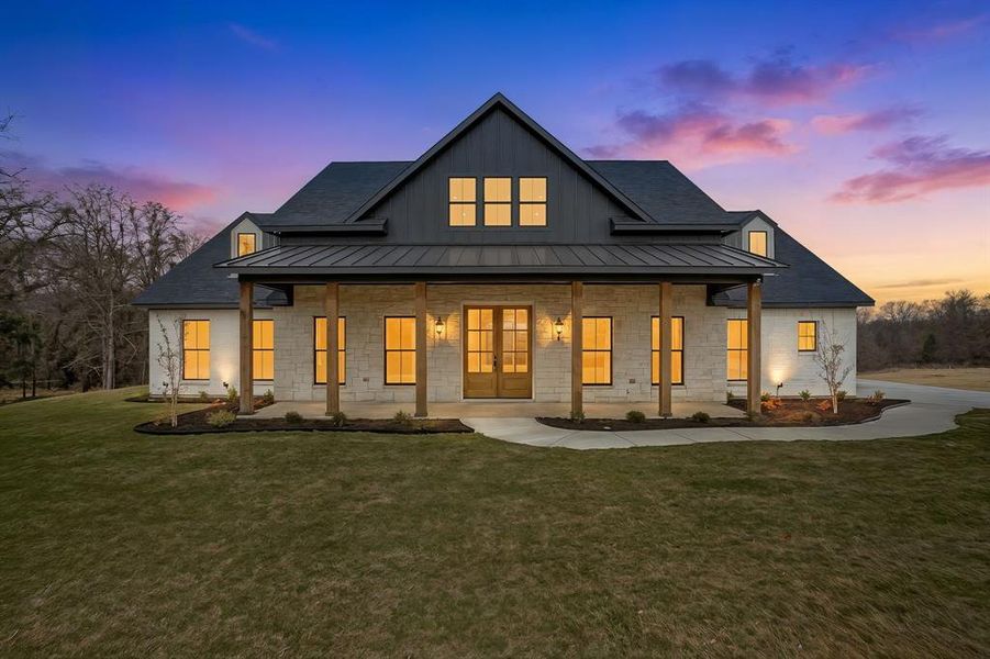 Front exterior of a new home in , Poolville, TX, highlighting curb appeal (Image 2). Front exterior of a new home in , Poolville, TX, highlighting curb appeal (Image 2).