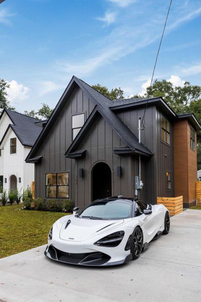Front exterior of a new home in , Charleston, SC, highlighting curb appeal (Image 2).
