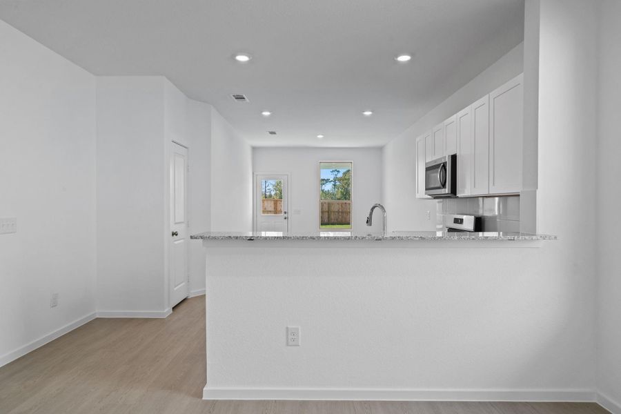 Furnished interior view inside a new home in Crosby Farms, Crosby (Image 4).