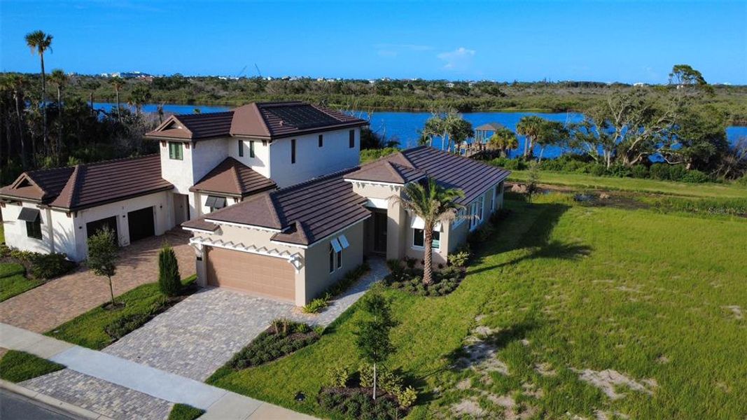 Front exterior of a new home in , Flagler Beach, FL, highlighting curb appeal (Image 10). Front exterior of a new home in , Flagler Beach, FL, highlighting curb appeal (Image 10).