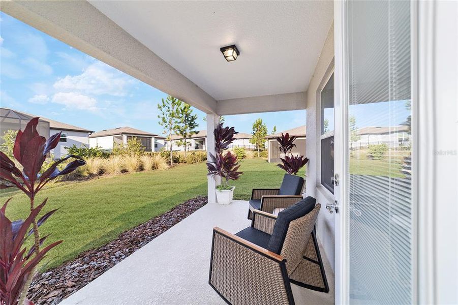 Exterior details and patio area of a home in Del Webb Stone Creek, Ocala (Image 4).