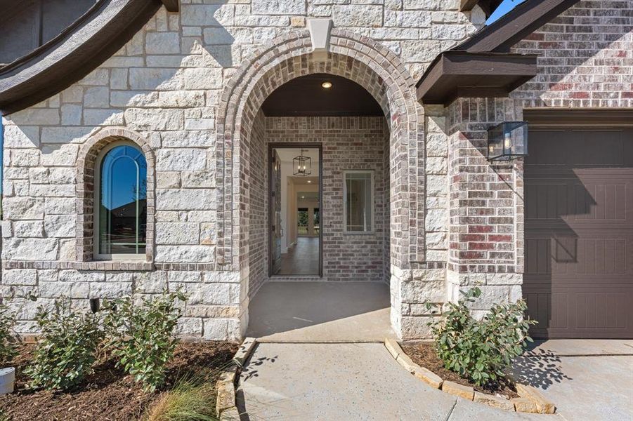 Exterior details and patio area of a home in Abe's Landing, Granbury (Image 24).
