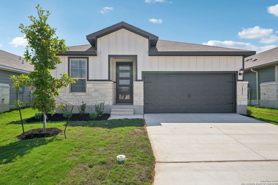 Front exterior of a new home in Catalina, Converse, TX, highlighting curb appeal (Image 2).