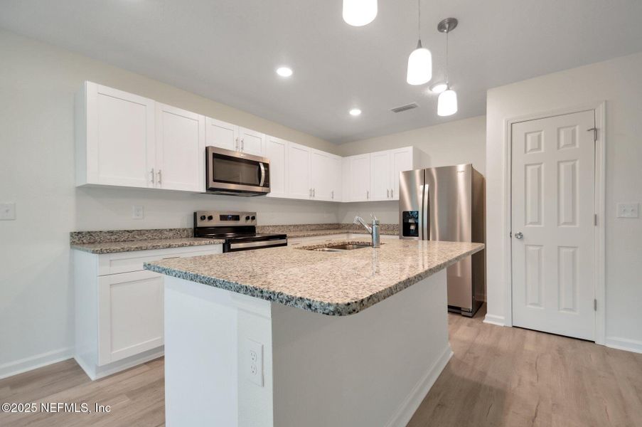 Furnished interior view inside a new home in , Jacksonville (Image 11). Furnished interior view inside a new home in , Jacksonville (Image 11).