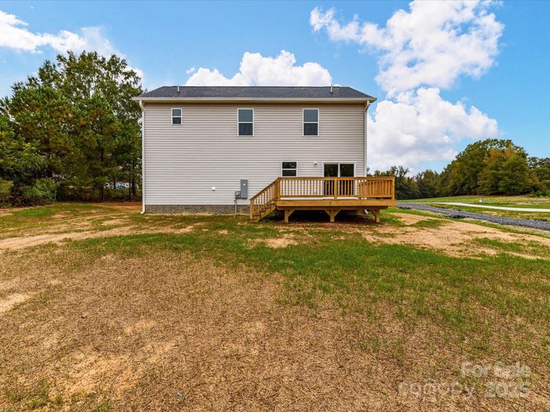 Exterior details and patio area of a home in , Oakboro (Image 21).
