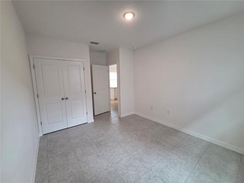 Spacious, unfurnished interior of a new home in Hammock Reserve, Haines City (Image 13). Spacious, unfurnished interior of a new home in Hammock Reserve, Haines City (Image 13).