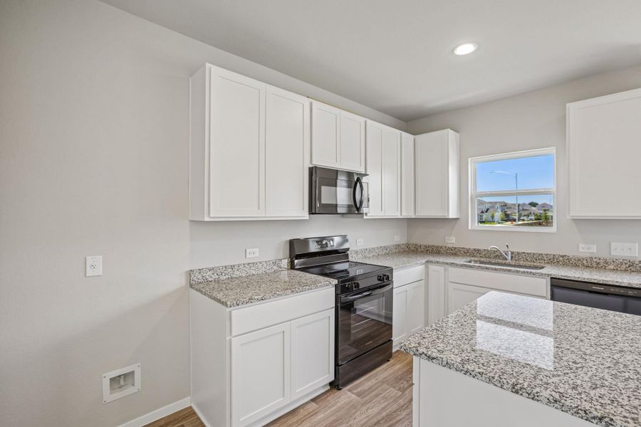 Furnished interior view inside a new home in Edgebrooke, Pflugerville (Image 9).