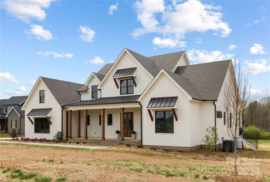 Front exterior of a new home in , Statesville, NC, highlighting curb appeal (Image 24).