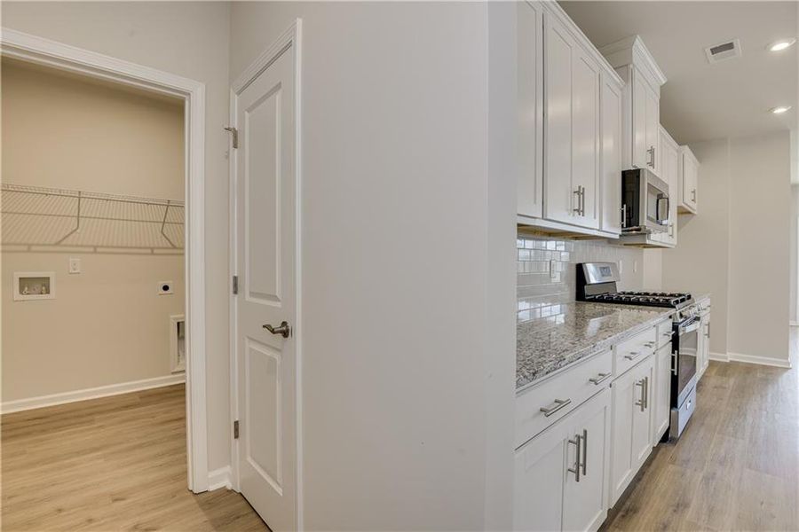 Furnished interior view inside a new home in , Powder Springs (Image 26).