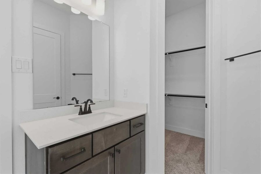 Representative furnished interior of a home built from the Palmer by Chesmar Homes in Riceland Alley Loads, Mont Belvieu (Image 9).