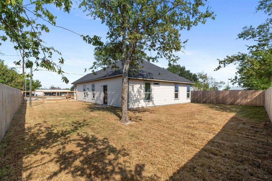 Exterior details and patio area of a home in , Bryan (Image 1).