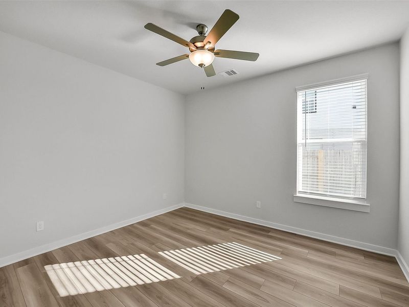 Spacious, unfurnished interior of a new home in Sunterra, Katy (Image 36).