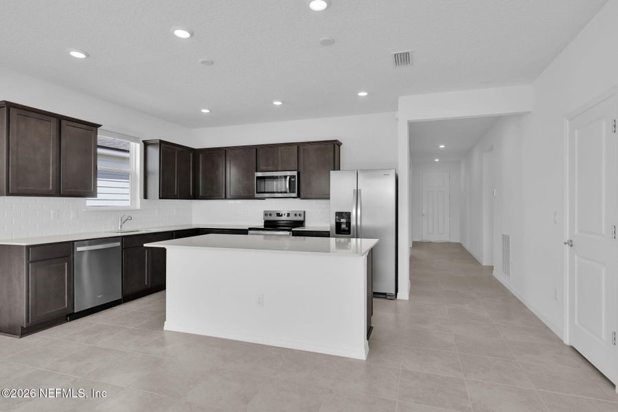 Furnished interior view inside a new home in Hyland Trail, Green Cove Springs (Image 11).
