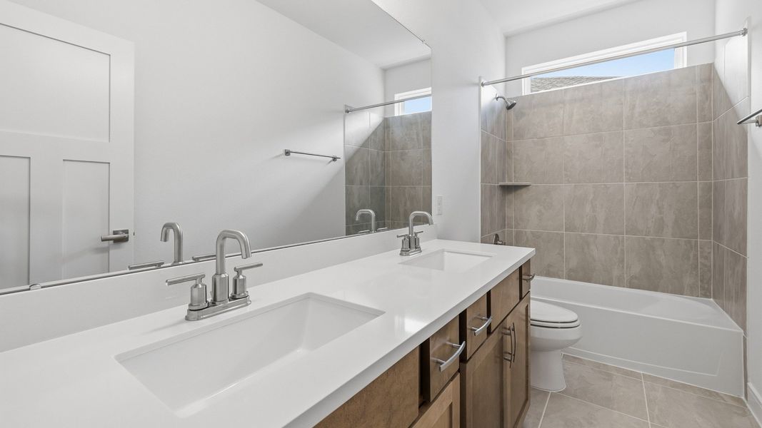 Representative furnished interior of a home built from the Paloma by Brightland Homes in Bridgeland Central, Cypress (Image 24).
