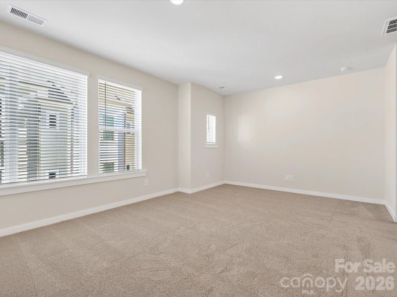 Spacious, unfurnished interior of a new home in Central Living at Craig, Charlotte (Image 24).