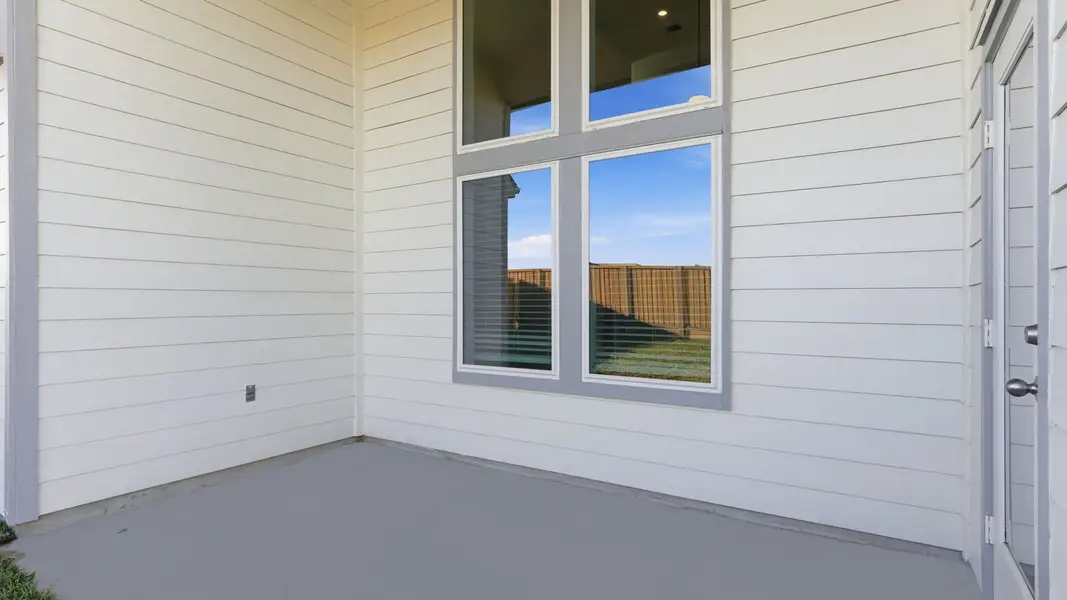 Exterior details and patio area of a home in Evergreen, Rosenberg (Image 3). Exterior details and patio area of a home in Evergreen, Rosenberg (Image 3).