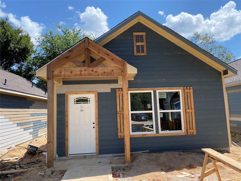 Front exterior of a new home in , Montgomery, TX, highlighting curb appeal (Image 2). Front exterior of a new home in , Montgomery, TX, highlighting curb appeal (Image 2).