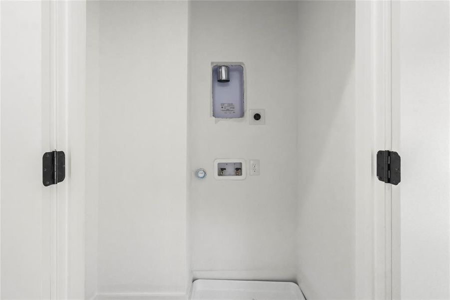 Laundry room with hookup for a washing machine and hookup for an electric dryer Laundry room with hookup for a washing machine and hookup for an electric dryer