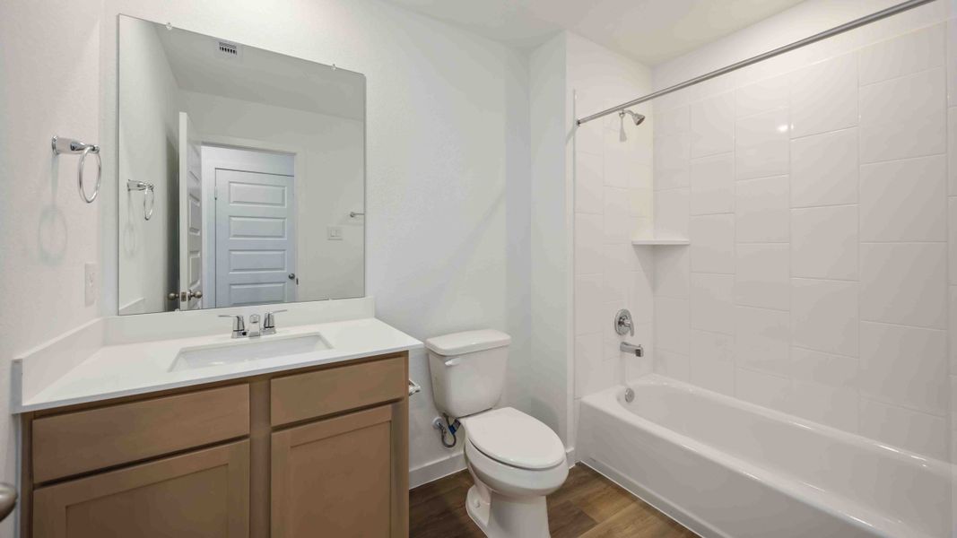 Furnished interior view inside a new home in Grand West, Houston (Image 5).