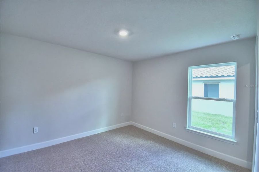 Spacious, unfurnished interior of a new home in Lake Juliana Estates, Auburndale (Image 22).