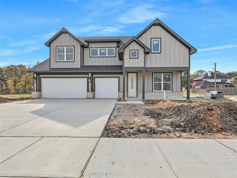 Front exterior of a new home in , Sherman, TX, highlighting curb appeal (Image 2).