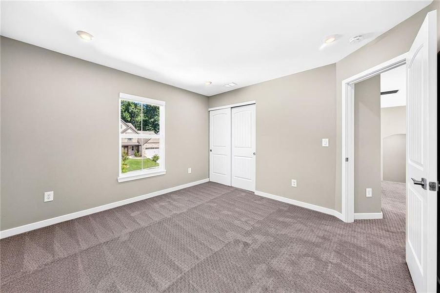 Spacious, unfurnished interior of a new home in The Reserve At Liberty Park, Braselton (Image 24).